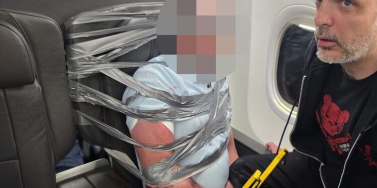 Disruptive passenger duct-taped to first-class seat as plane makes emergency landing at BWI Marshall Airport
